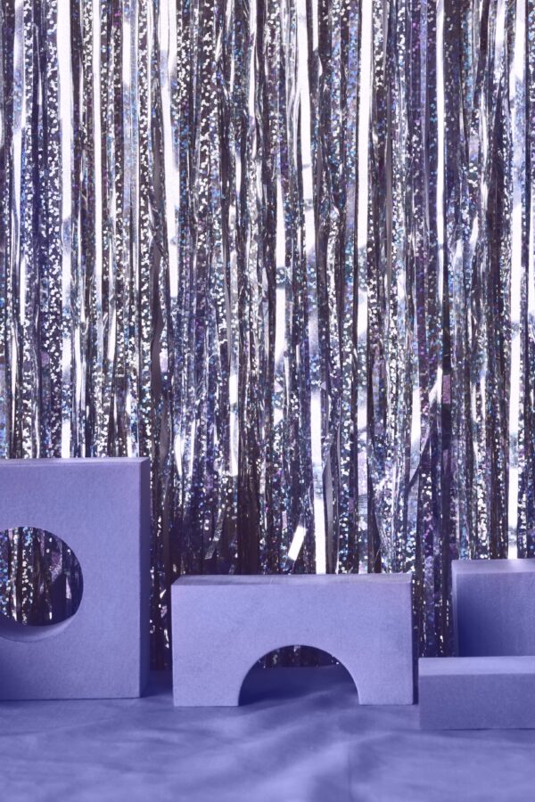 Shining creative wall table background in violet colors. Trendy Color of year 2022 Presentation